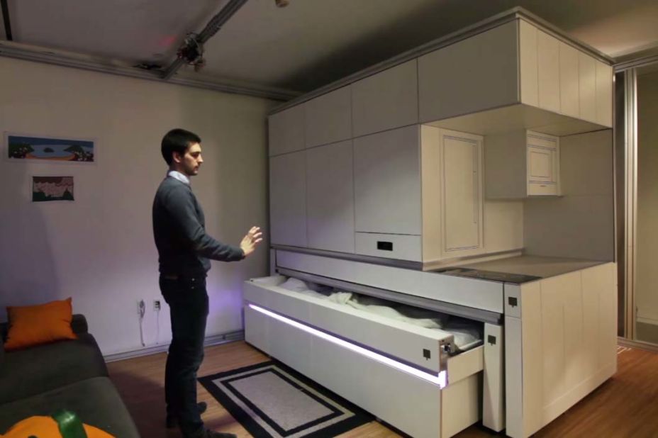 MIT's CityHome project uses a multi-functional furniture unit that can provide a kitchen, living room, bedroom and bathroom.