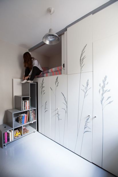 Studio Kitoko designed a micro apartment for Paris in which furniture adapts to several different roles. 