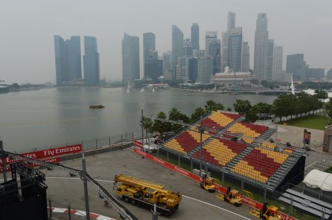 The Singapore waterfront stadium and Formula One racetrack are blanketed by haze in the final days of the build-up to the 2014 race.