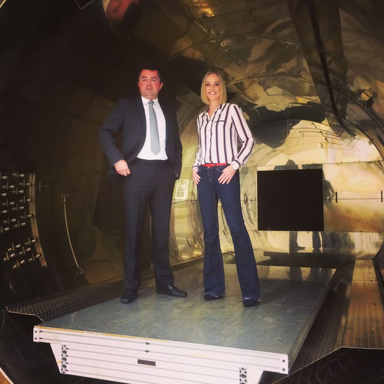 The carbon fiber car parts are cooked inside an autoclave. This giant oven is used to bake the car chassis and temperatures reach up to 300 degrees Celsius or 572 Fahrenheit. Luckily it wasn't turned on when Eric and Amanda stepped inside.