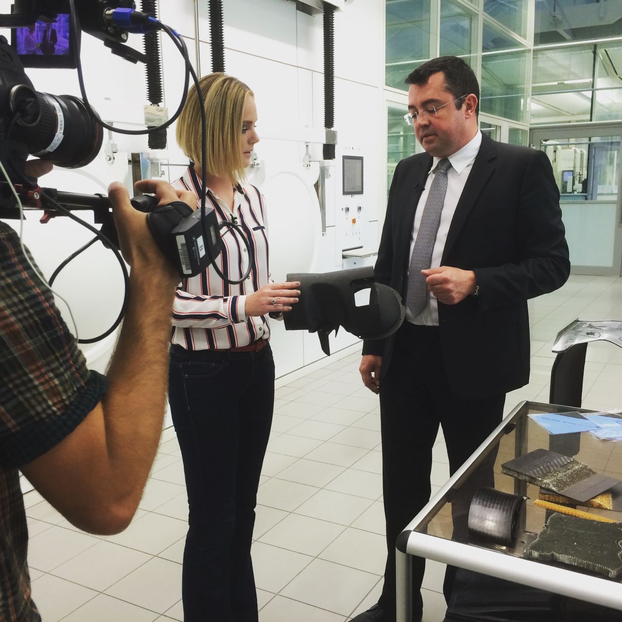 McLaren racing director Eric Boullier shows CNN sports anchor Amanda Davies some of the carbon fiber parts used to build an F1 car. "3D printing is something we are looking at for the future to make more complex parts," Boullier tells CNN.