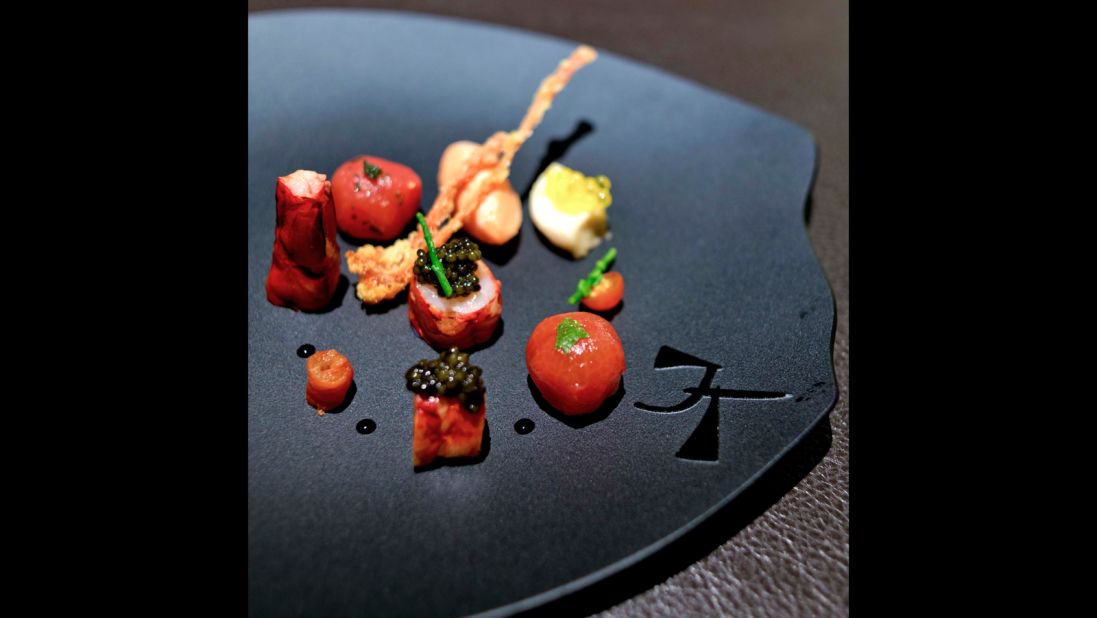 Corner House's creative inventions include this carabinero prawn with textures of tomato and Kristal caviar.