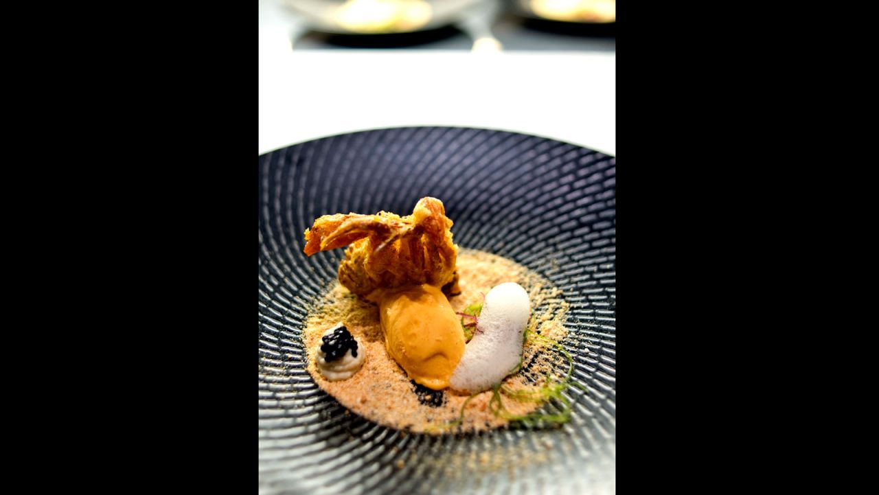 This modern Singapore cuisine restaurant is arguably the most inventive among the newcomers. Chef Han Li Guang's version of chili crab is a deep-fried soft shell crab served with spicy chili crab ice cream and ethereal crab bisque foam. These are placed on a "beach" of man tou crumbs.