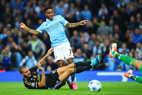 Raheem Sterling of Manchester City is challenged by Leonardo Bonucci of Juventus during the UEFA Champions League Group D match between Manchester City FC and Juventus at the Etihad Stadium on Tuesday. 