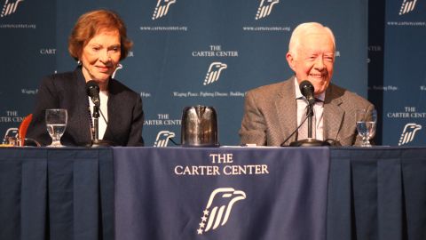 Former President Jimmy Carter and his wife, Rosalynn, spoke to the Carter Center crowd Tuesday night. 