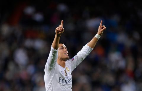 Cristiano Ronaldo of Real Madrid celebrates after scoring Real's third goal from the penalty spot during the Champions League Group A match between Real Madrid and Shakhtar Donetsk, which gave him 80 career goals in the competition.