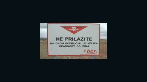 A sign in Croatia warns of landmines from the Balkan Wars in the area.
