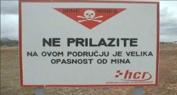 A sign in Croatia warns of landmines from the Balkan Wars in the area.