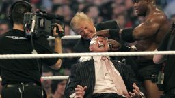 DETROIT - APRIL 1: WWE chairman Vince McMahon (C) has his head shaved by Donald Trump (L) and Bobby Lashley (R) after losing a bet in the Battle of the Billionaires at the 2007 World Wrestling Entertainment's Wrestlemania at Ford Field on April 1, 2007 in Detroit, Michigan. Umaga was representing McMahon in the match when he lost to Bobby Lashley who was representing Trump. (Photo by Bill Pugliano/Getty Images)