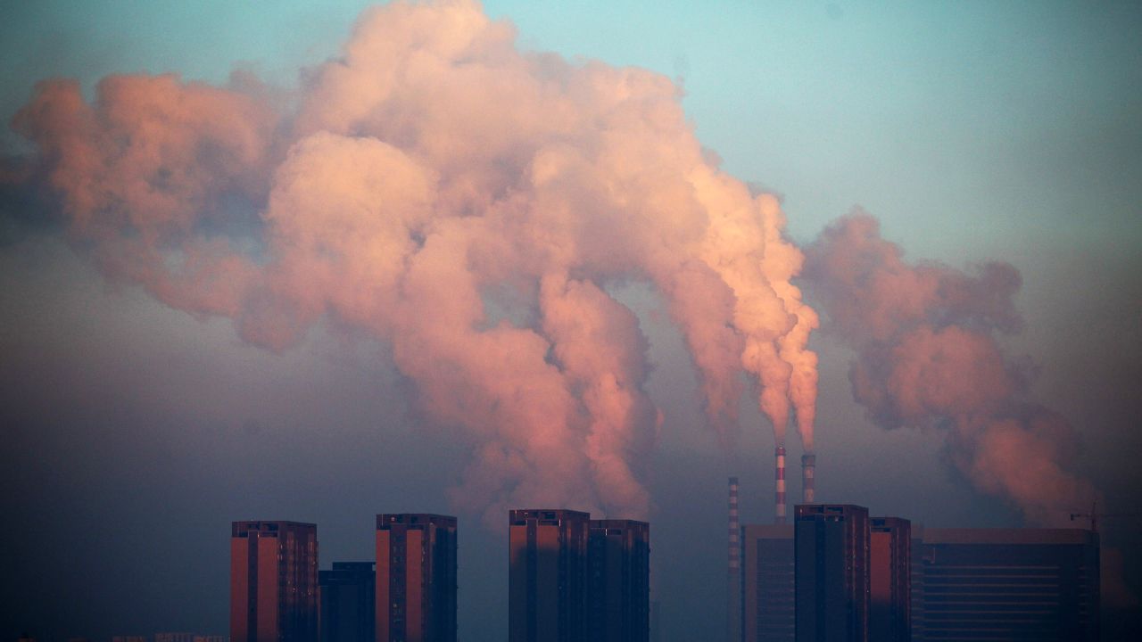 This picture taken on January 22, 2013 shows a thermal power plant discharging heavy smog into the air in Changchun, northeast China's Jilin province. China has cleaned up its air before but experts say that if it wants to avoid the kind of smog that choked the country this week, it must overhaul an economy fuelled by heavily polluting coal and car use.  CHINA OUT     AFP PHOTO        (Photo credit should read STR/AFP/Getty Images)