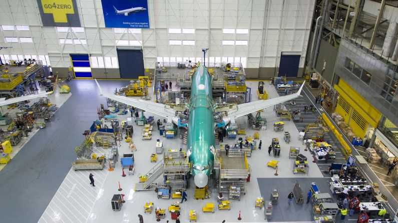 Final assembly is underway on the Boeing 737 MAX 8, the first member of the aerospace company's new, more efficient single-aisle airplane family. The first 737 MAX is expected to roll out by the end of the year. 