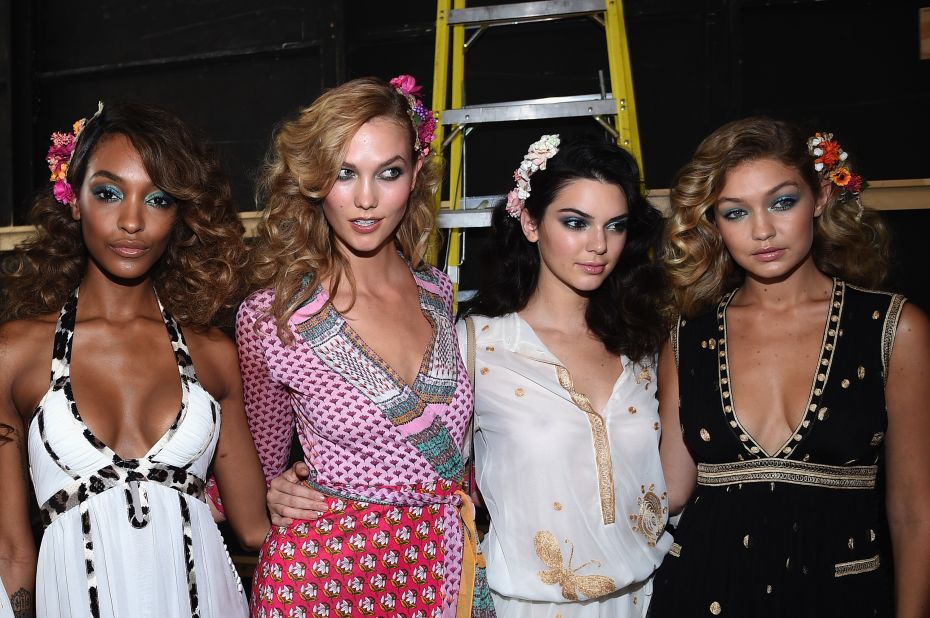 Models Jourdan Dunn, Karlie Kloss, Kendall Jenner and Gigi Hadid pose backstage before the show.
