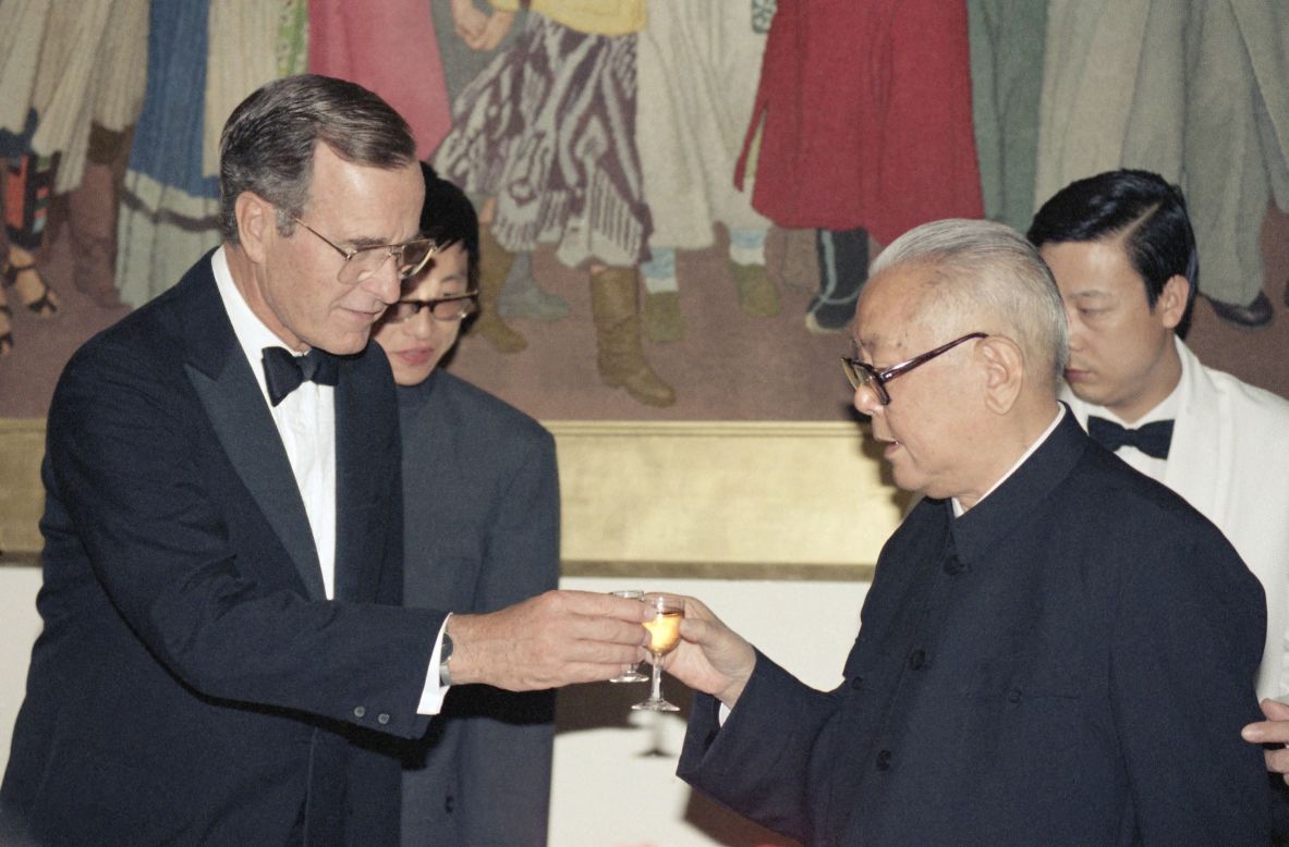 Then U.S. Vice President George H. W. Bush proposes a toast to former Chinese President Li Xiannian during a dinner at the Chinese Embassy in Washington D.C. in July, 1985. Li, the first Chinese head of state to visit the United States, hosted the dinner in Bush's honor.
