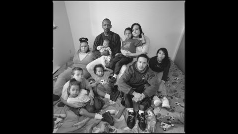 Tiny and her husband, Will, pose with their children in 2003.