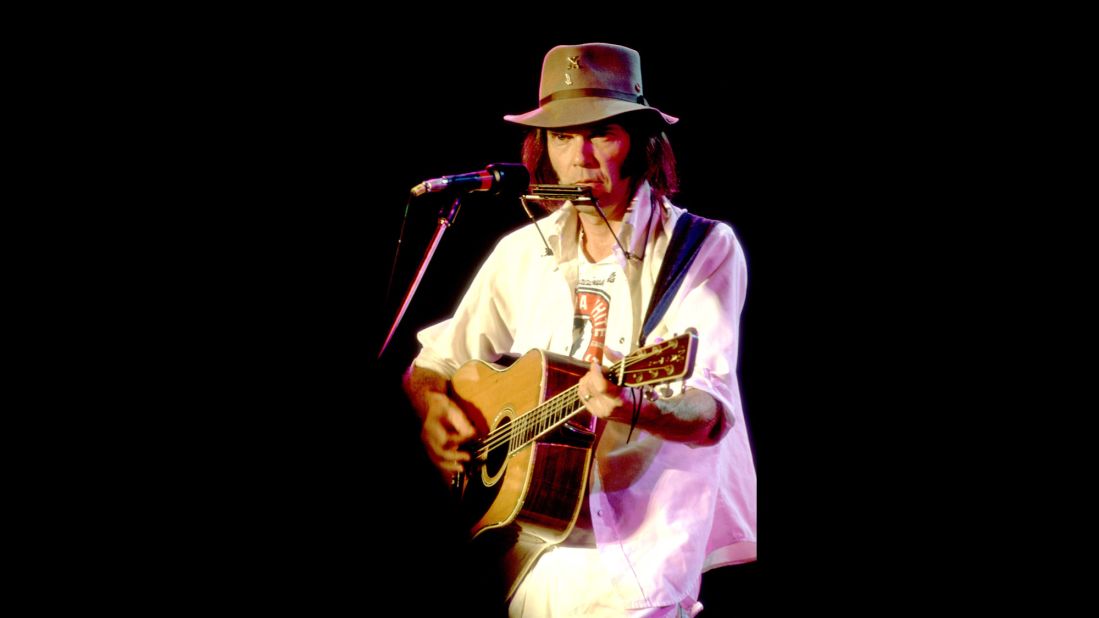 Neil Young -- who co-founded the event -- is seen here performing at the original Farm Aid. Young emerged after his experimental '80s period with a hit, "Rockin' in the Free World," in 1989, and was hailed as a forerunner of grunge, even touring with Pearl Jam. 