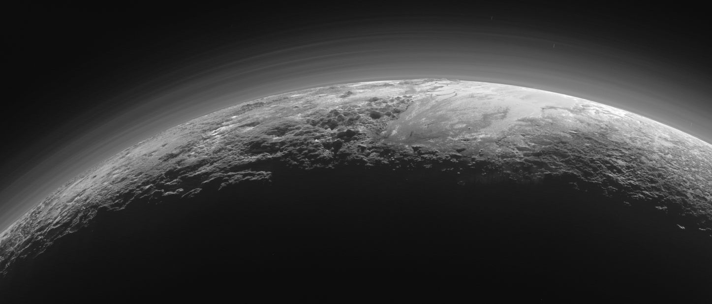 This image of the surface of Pluto was taken just 15 minutes after NASA's New Horizon spacecraft made its closest approach to the icy planet on July 14. As it looked toward the Sun, the spacecraft's camera captured more than dozen thin layers of haze in Pluto's atmosphere, at least 60 miles (100 kilometers) above the surface. The photo was downlinked to Earth on September 13.