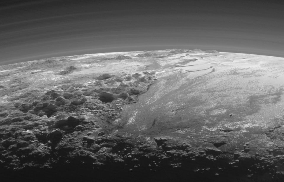 This image of Pluto's icy and mountainous landscapes was taken from a distance of 11,000 miles (17,700 kilometers). "This image really makes you feel you are there, at Pluto, surveying the landscape for yourself," said New Horizons Principal Investigator Alan Stern of the Southwest Research Institute in Colorado.