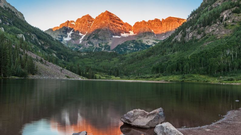 The Maroon Bells are the most photographed mountains in Colorado and among the most photographed in all of North America. They're best photographed in the morning since they catch the first rays of light. 