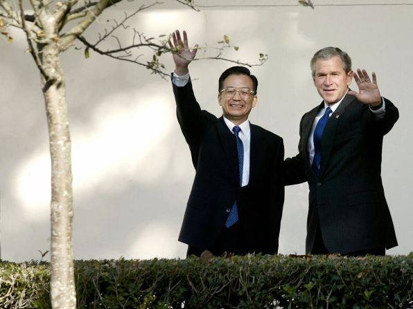 U.S. President George W. Bush and former Chinese Premier Wen Jiabao walk along the colonnade before a meeting at the White House in Washington, D.C. on December 9, 2003. Speaking with Bush at his side in the Oval Office, Wen warned Taiwan not to seek independence, while Bush reaffirmed the so-called "One China" policy of the United States, which maintained that Taiwan is a part of China.