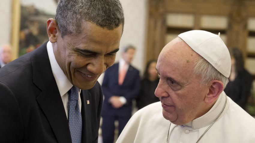 Pope Francis (R) speaks with US President Barack Obama during a private audience on March 27, 2014 at the Vatican. The meeting at the Vatican comes as a welcome rest-stop for Obama during a six-day European tour dominated by the crisis over Crimea, and the US leader will doubtless be hoping some of the pope's overwhelming popularity will rub off on him.    AFP PHOTO / SAUL LOEB        (Photo credit should read SAUL LOEB/AFP/Getty Images)