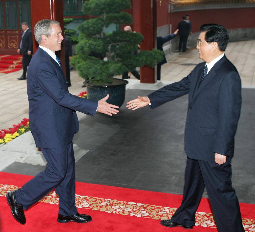 Former Chinese President Hu Jintao greets U.S. President George W. Bush in Beijing, China in August, 2008. Bush attended the opening ceremony of the 2008 Summer Olympics Games in Beijing during his trip to Asia that month.
