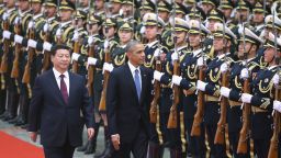 BEIJING, CHINA - NOVEMBER 12:  Chinese President Xi Jinping (L) accompanies U.S. President Barack Obama (R) to view an honour guard during a welcoming ceremony outside the Great Hall of the People on November 12, 2014 in Beijing, China. U.S. President Barack Obama pays a state visit to China after attending the 22nd Asia-Pacific Economic Cooperation (APEC) Economic Leaders' Meeting.  (Photo by Feng Li/Getty Images)