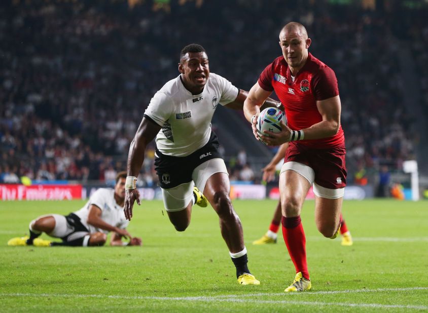 England's Mike Brown sprints free to score the second try of the match. The full back added another in the second half as the host's eventually ran out 35-11 winners.