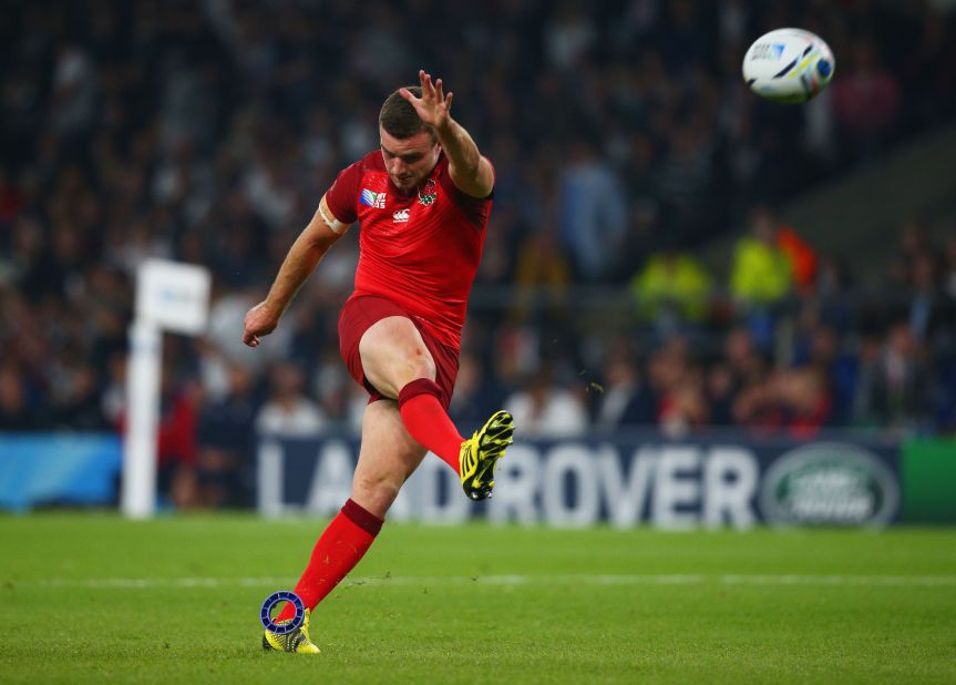 George Ford of England successfully converts under the lights at Twickenham.