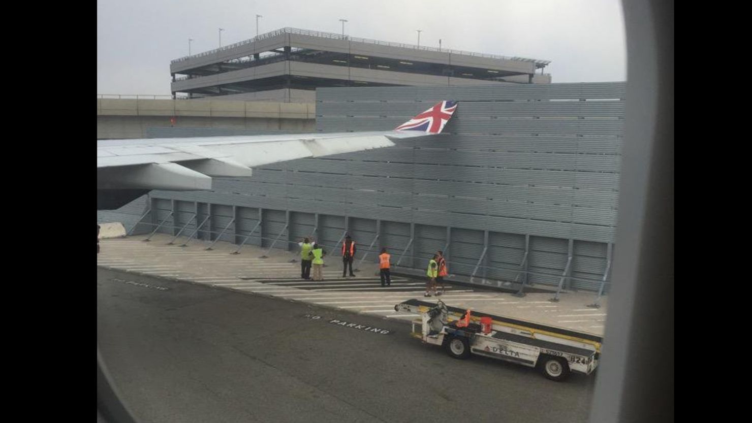 The plane "shuddered" as it hit the fence, a Virgin Atlantic flight passenger said.
