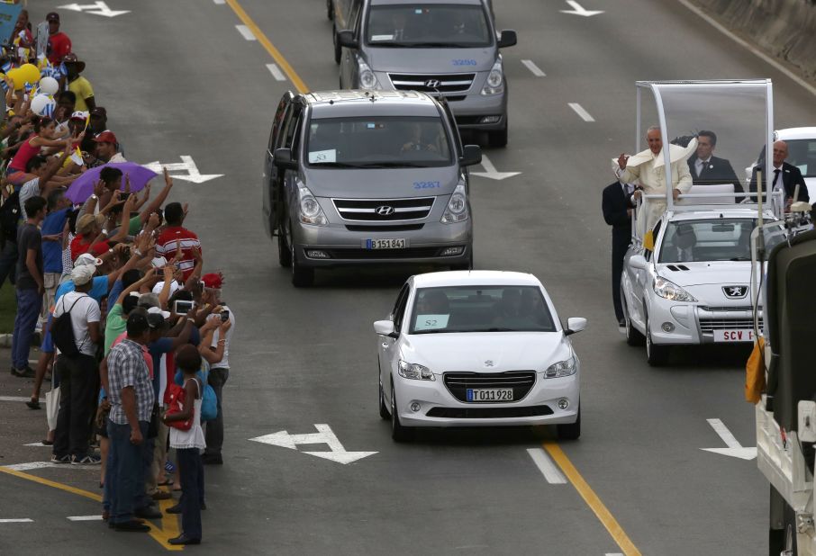 Crowds line the streets to greet the Pope in Havana on September 19. 