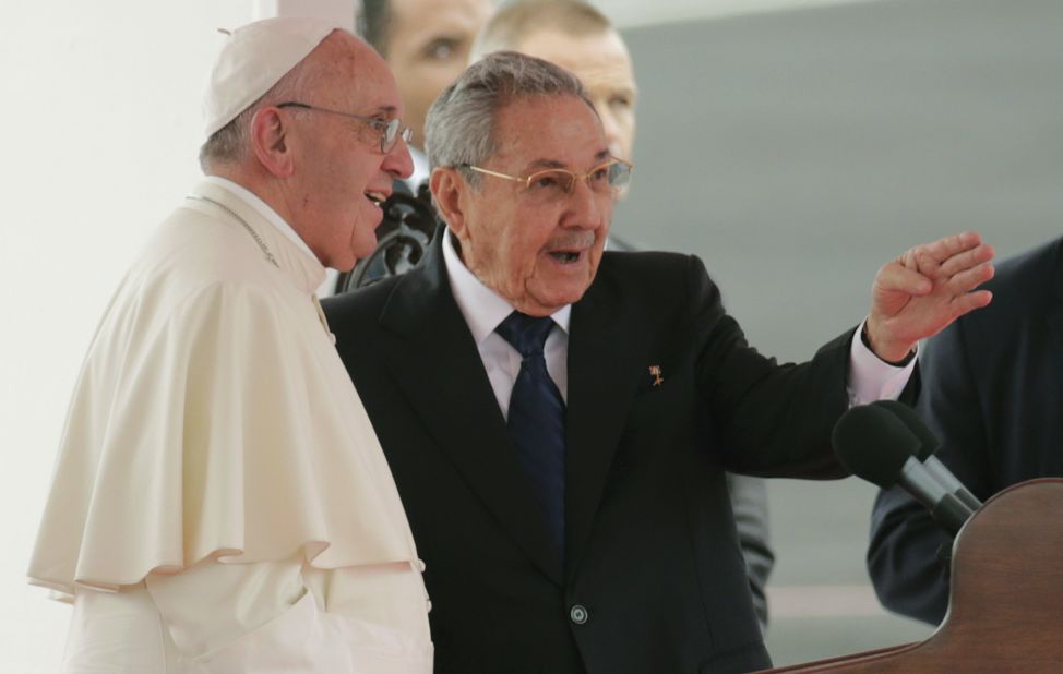 Pope Francis speaks with Cuban President Raul Castro during his arrival ceremony on September 19. 