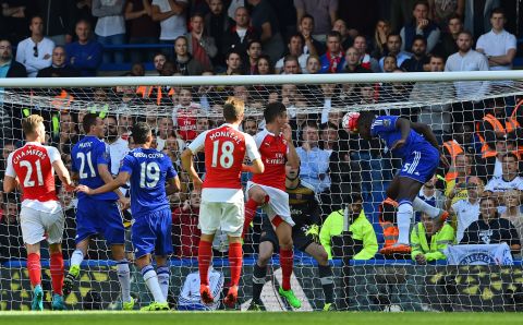 Defender Kurt Zouma (R) heads Chelsea's opening goal in the 53rd minute.