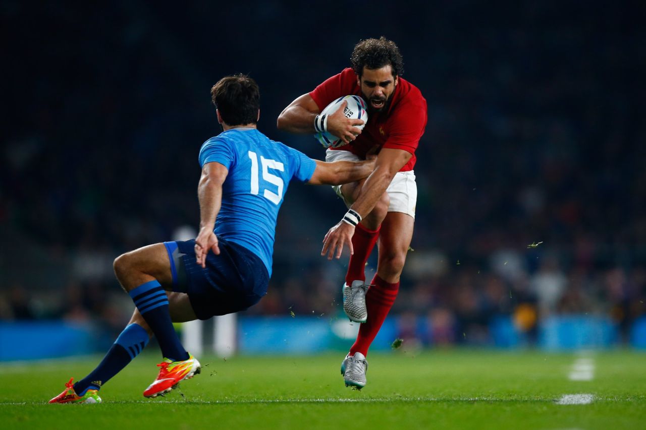 France, beaten in the 2011 final by New Zealand, opened its Pool D campaign on a winning note at Twickenham but winger Yoann Huget (with ball) is expected to miss the rest of the tournament after being carried off with an injury. 