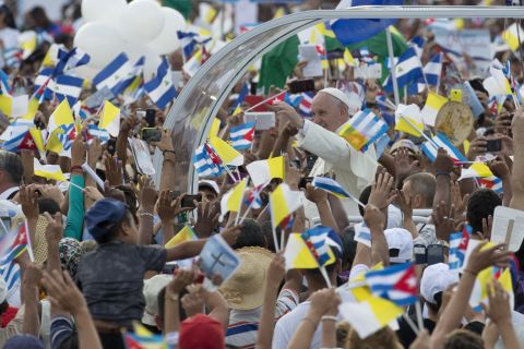 Crowds surround the Pope as he arrives in Revolution Square on September 20. 