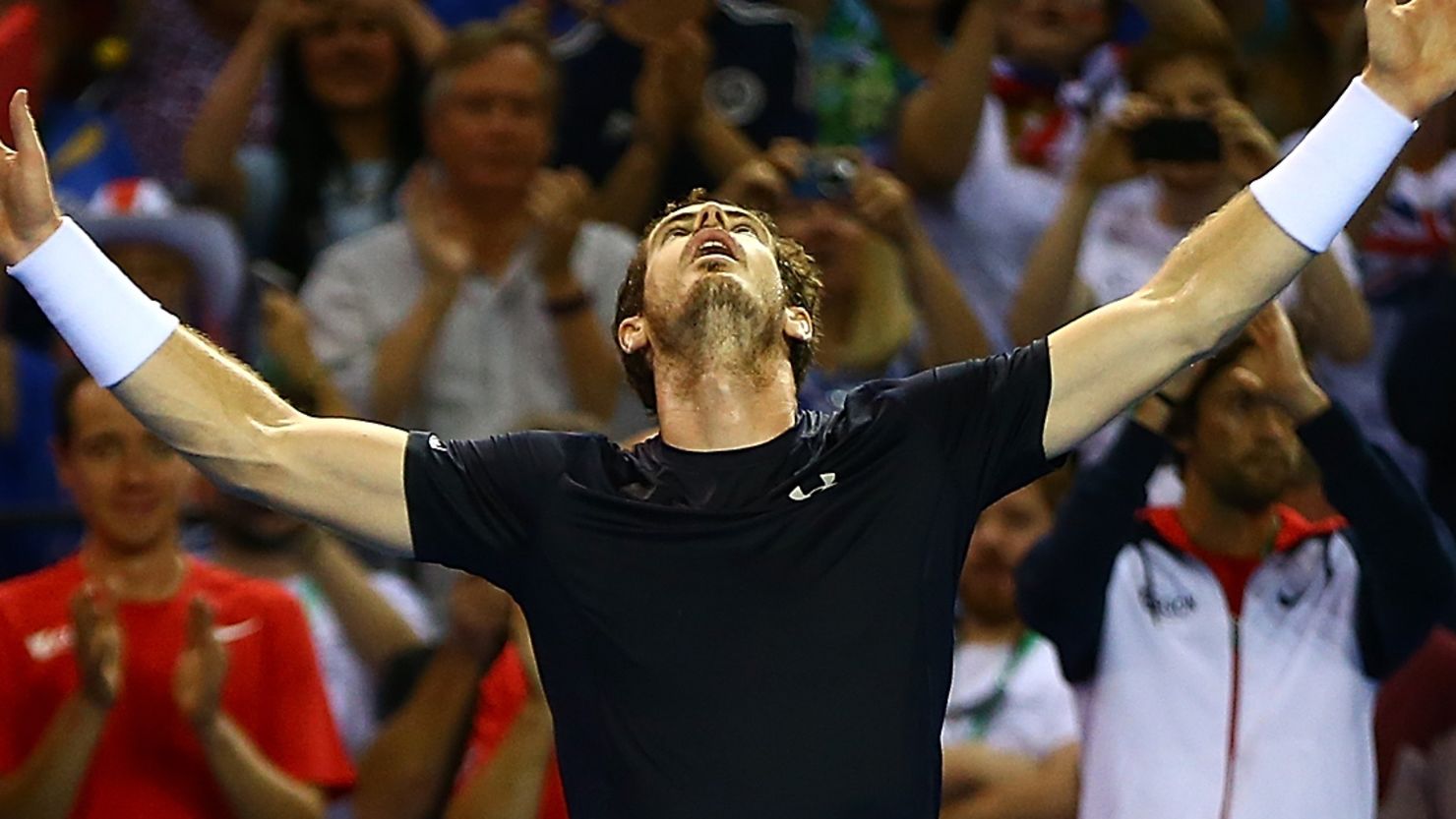 Andy Murray savors his clinching victory for Great Britain in the Davis Cup semifinal against Australia in Glasgow.