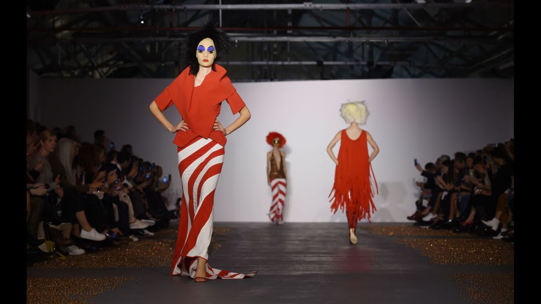 At Gareth Pugh, models faces were covered in gauze, which was then painted with makeup. The final effect was somewhere between a clown and drag star <a href="http://divineofficial.com/" target="_blank" target="_blank">Divine</a>.