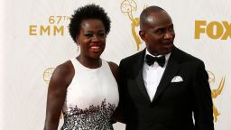 IMAGE DISTRIBUTED FOR THE TELEVISION ACADEMY - Viola Davis, left, and Julius Tennon arrive at the 67th Primetime Emmy Awards on Sunday, Sept. 20, 2015, at the Microsoft Theater in Los Angeles. (Photo by Danny Moloshok/Invision for the Television Academy/AP Images)