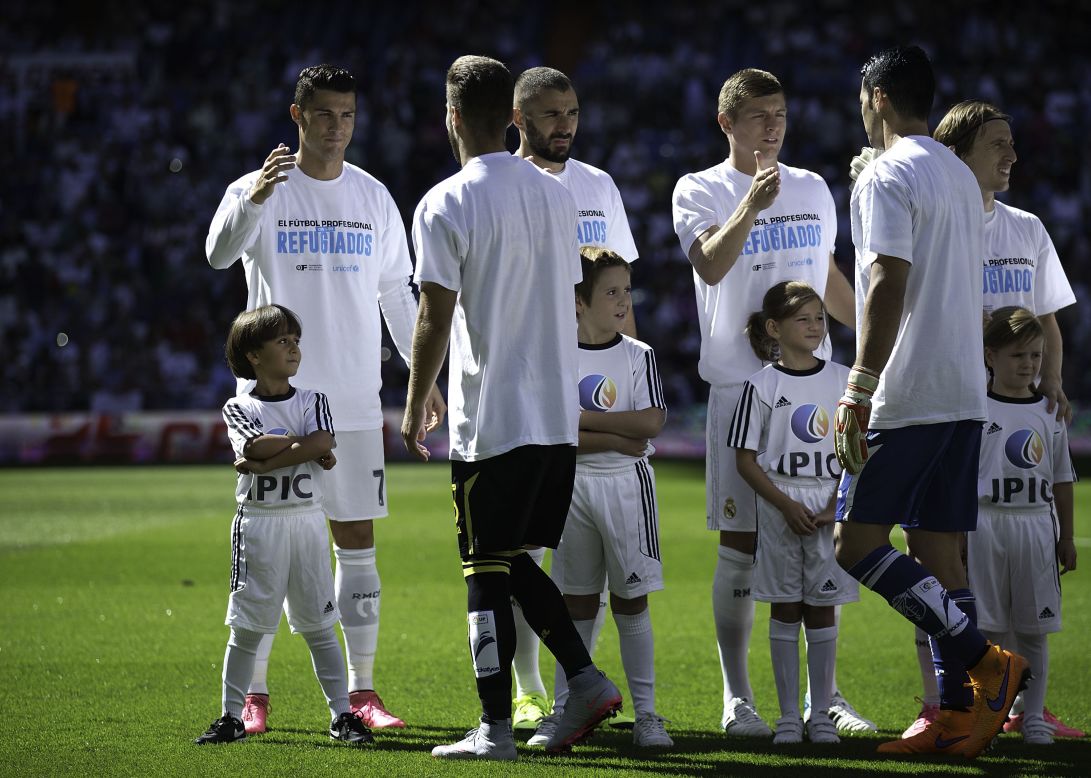 <strong>September 19, 2015: </strong>Cristiano Ronaldo may not have scored, but he did walk out at the Bernabeu with the son of the Syrian refugee tripped by a Hungarian journalist. Osama Alabed Al-Mohsen and his 7-year-old son Zied were guests of honor for Real Madrid's 1-0 win over Granada. 
