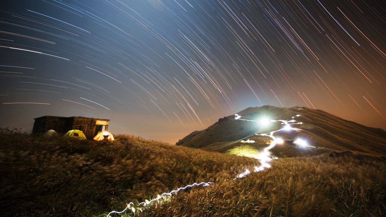 <strong>People and Space category winner:</strong> Chap Him Wong, "Sunset Peak Star Trail." Sunset Peak is in Hong Kong.