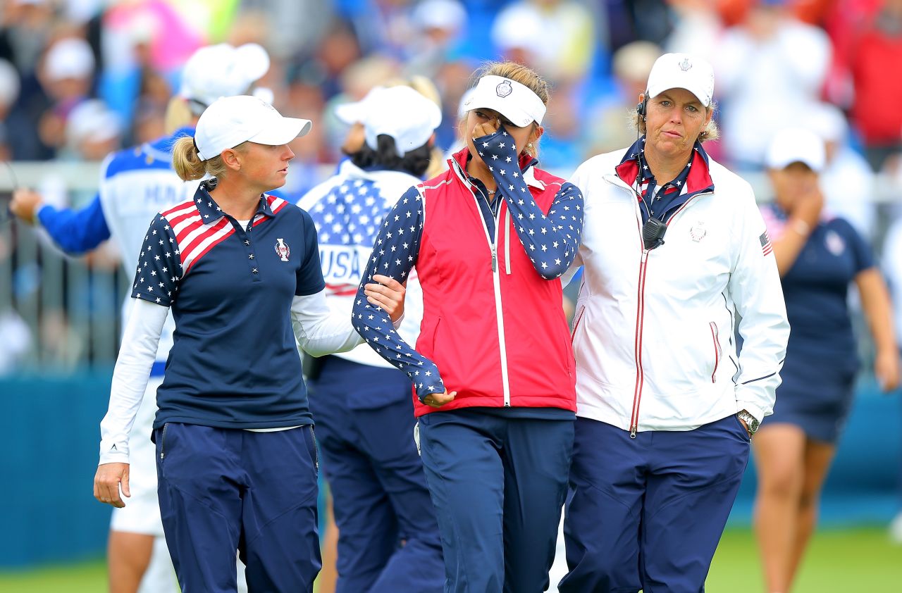 Team USA's Alison Lee was reduced to tears on the 18th hole after she picked up her ball on the 17th green before it had been conceded by her European Team opponents Pettersen and England's Charley Hull. 