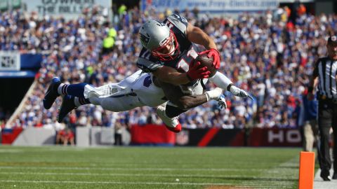 New England Patriots wide receiver Julian Edelman dives for a touchdown during an NFL game in Buffalo, New York, on Sunday, September 20. Buffalo safety Aaron Williams suffered a serious neck injury trying to make the tackle. He has since been released from the hospital.