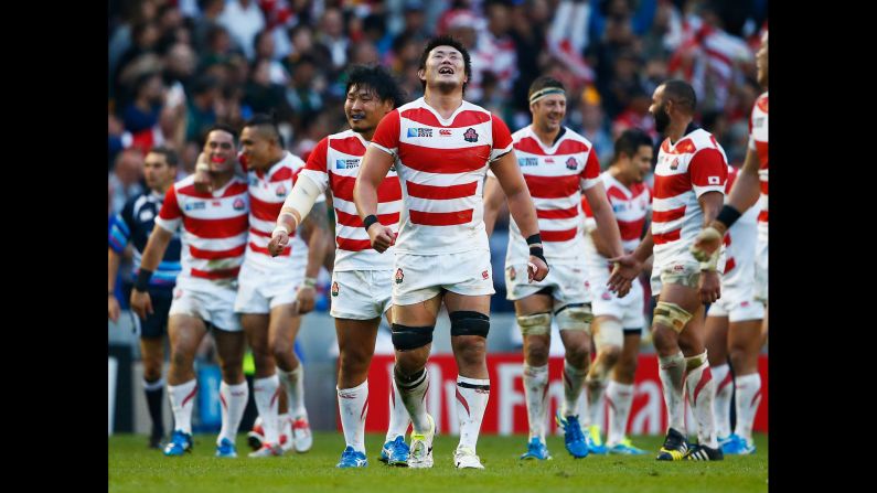 Japan's rugby team celebrates a surprise victory over South Africa at the Rugby World Cup on Saturday, September 19. The "Brave Blossoms" <a href="index.php?page=&url=http%3A%2F%2Fwww.cnn.com%2F2015%2F09%2F19%2Fsport%2Frugby-world-cup-japan-south-africa%2F" target="_blank">stunned the heavily favored Springboks</a> 34-32 in what was one of the biggest upsets in rugby history. Japan hadn't won a World Cup match since 1991. South Africa is a rugby powerhouse that has won World Cups in 1995 and 2007.