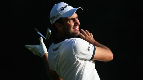 Edoardo Molinari lets go of his club as he hits a shot Friday, September 18, at the Italian Open, a European Tour event in Monza, Italy.
