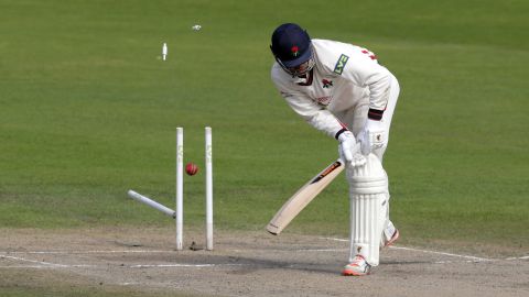 Lancashire's Tom Bailey is bowled by Surrey's Sam Curran during a cricket match in Manchester, England, on Wednesday, September 16.