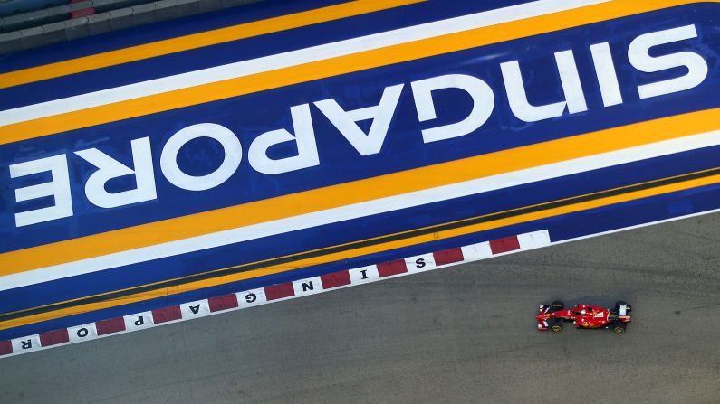 Sebastian Vettel drives his Ferrari on Saturday, September 19, a day before winning the Singapore Grand Prix.