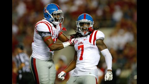 Ole Miss teammates Tony Conner, left, and Trae Elston celebrate after Elston intercepted a pass at Alabama on Saturday, September 19. Ole Miss upset Alabama for the second straight season, winning 43-37.