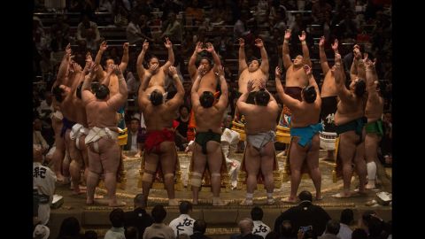 Wrestlers enter the ring during the Tokyo Grand Sumo tournament on Thursday, September 17. <a href="http://www.cnn.com/2015/09/15/sport/gallery/what-a-shot-sports-0915/index.html" target="_blank">See 44 amazing sports photos from last week</a>