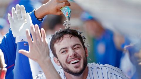 Fernando Rodney of the Chicago Cubs pours sunflower seeds onto Kris Bryant in 2015.