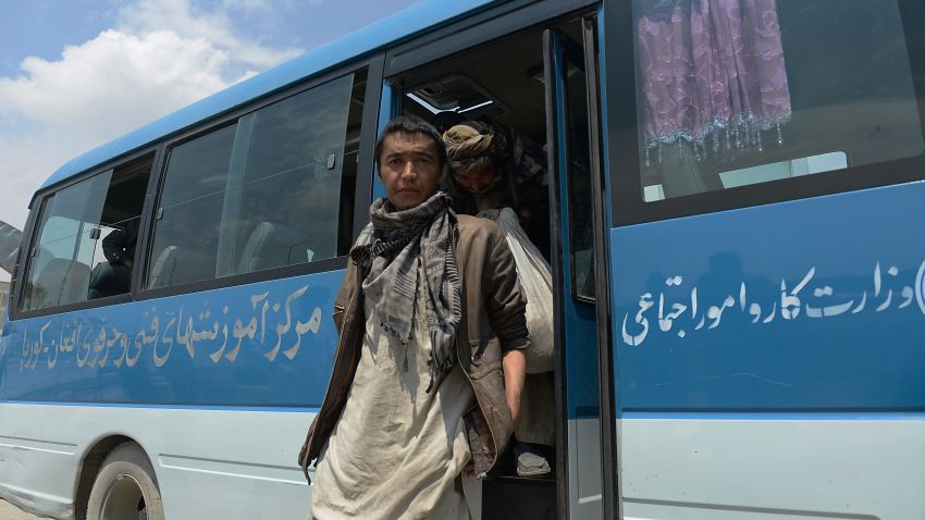 Afghan drug addicts arrive by bus to register their names during a campaign by the NEJAT drug treatment centre in Kabul on April 20, 2014. The NEJAT Centre is an Afghan response to vulnerable Afghan people, working with the communities for the prevention, treatment and care of drug users and HIV/Aids patients. Afghanistan produces around 90 percent of all opiate drugs in the world, but only recently became a major consumer - out of a population of 35 million, more than a million are now addicted to drugs.  AFP PHOTO/SHAH Marai        (Photo credit should read SHAH MARAI/AFP/Getty Images)