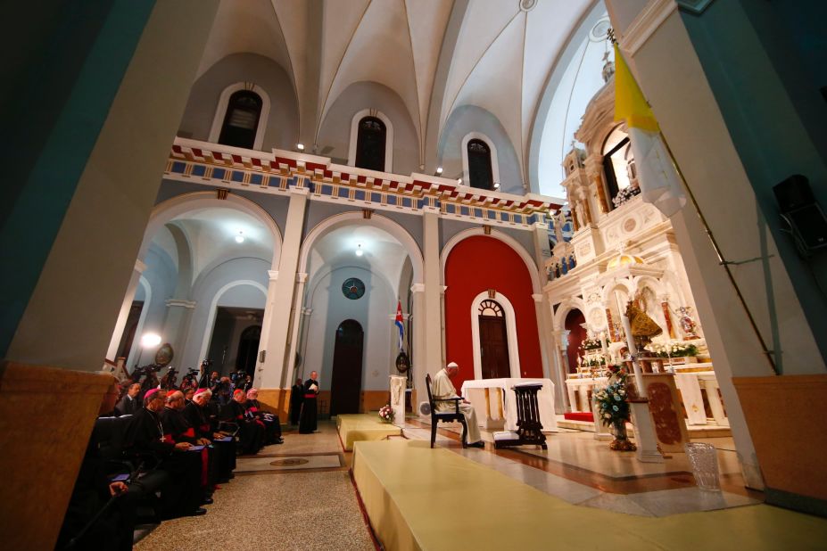 Pope Francis prays inside a sanctuary in El Cobre, Cuba, on Monday, September 21.